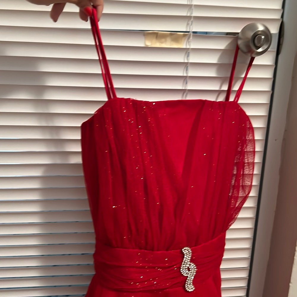 a formal dress it’s color red with sparkles it’s really shiny xs or small